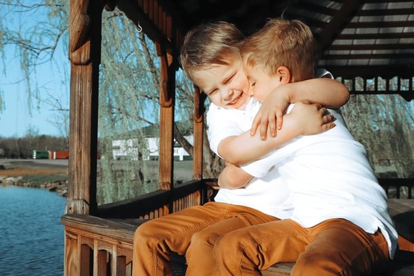 Boys Hugging in one of our Gazebos